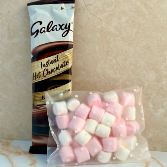 galaxy hot chocolate with pink and white marshmallows 