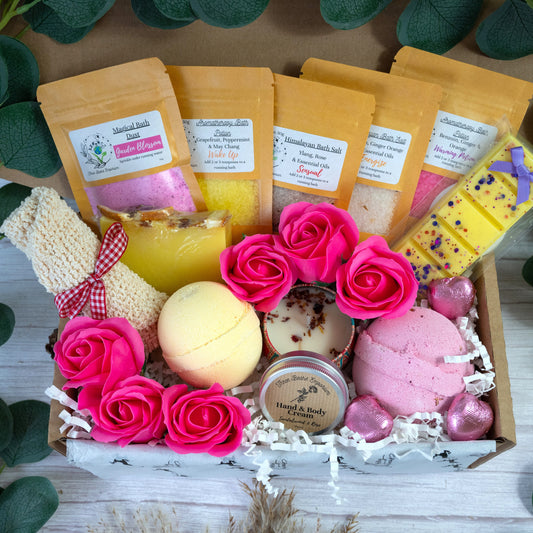 Pamper box for her filled with bath bombs, bath salts and more. Available to gift by post